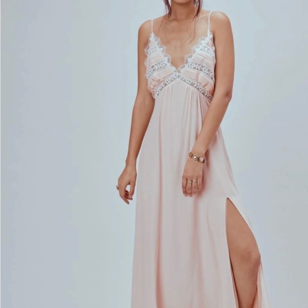 Elegant  Lace Maxi Dress by Free People lovebird. dress is white! Not blush